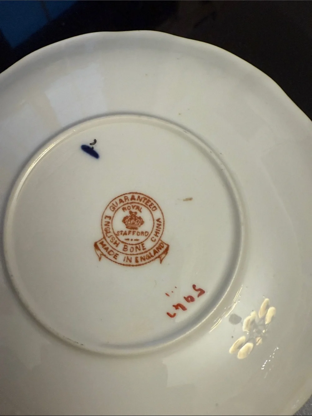 Decorative White and Navy Porcelain Tea Cup with Gold Accents